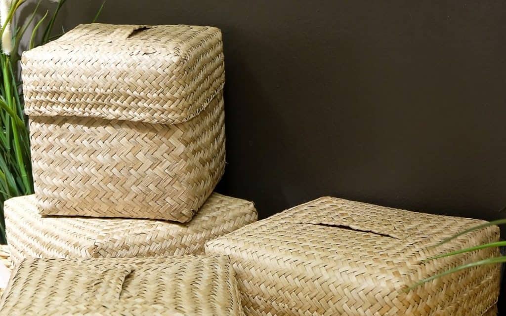 wicker-storage-cubes-stacked-against-wall